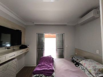 Dormit�rio Su�te com Sacada 