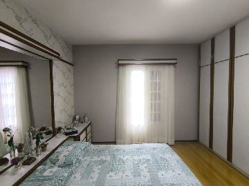 Dormit�rio com Sacada