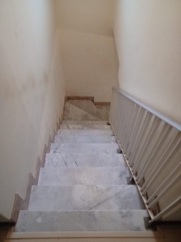 Escada entra Pavimentos