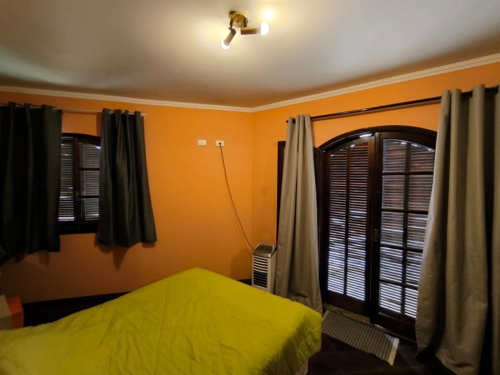 Dormitório com varanda